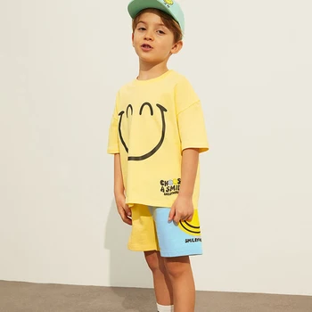 Корейские комплекты летней повседневной одежды для маленьких мальчиков, Детская Новая футболка с принтом улыбки + Свободные шорты, костюмы из 2 предметов, детский спортивный костюм